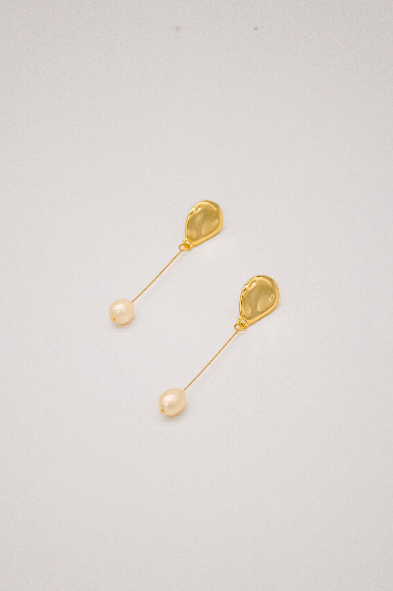 Long drop Pear Gold Earrings